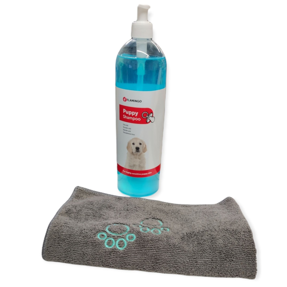 Shampoing Shampoing 1L pour chiot avec une serviette en microfibre.